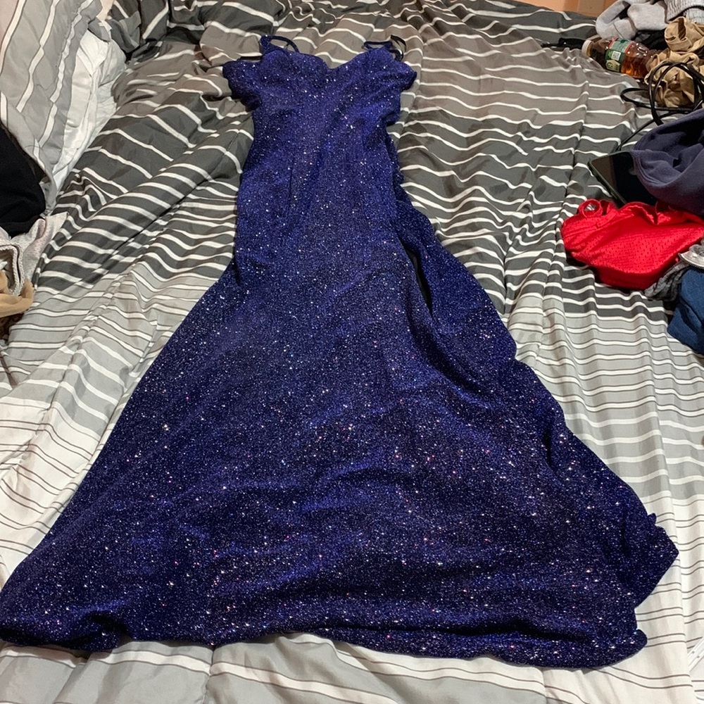 It’s a prom dress, never worn